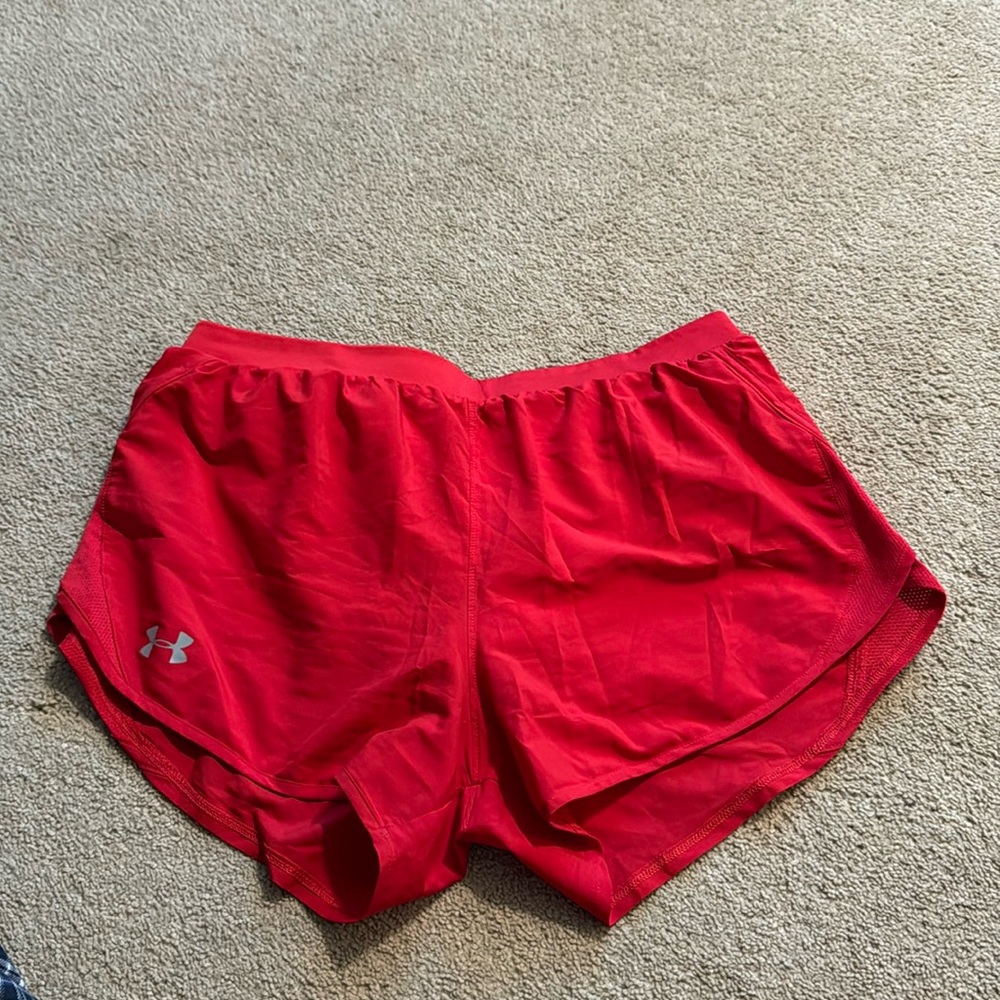 Under Armour red athletic shorts